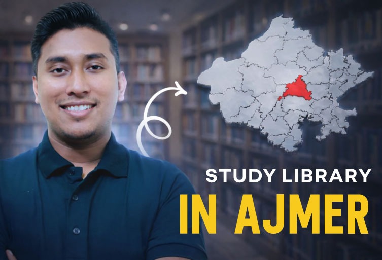 A quiet, well-lit study library in Ajmer featuring ergonomic wooden desks, individual partitions, and students focused on their books in a peaceful academic environment.